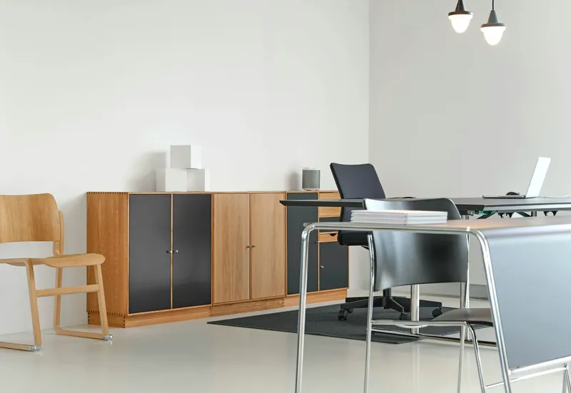 Modern office environment with flexible scheduling and voluntary time off options
